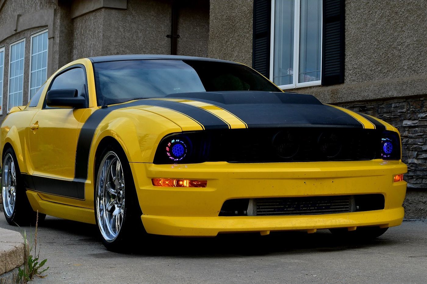 Yellow and black Ford Mustang